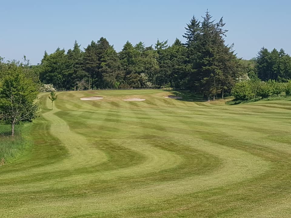 2nd Green under a blue sky